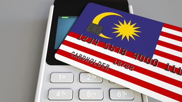 Payment or POS Terminal with Credit Card Featuring Flag of Malaysia