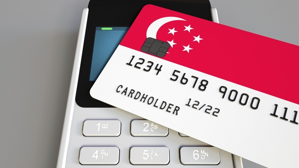 Payment or POS Terminal with Credit Card Featuring Flag of Singapore