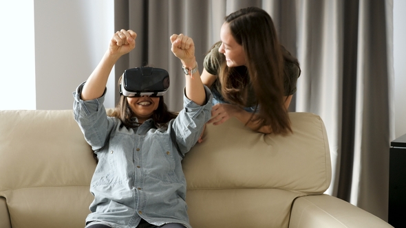 Woman Enjoying Virtual Reality with a VR Headset