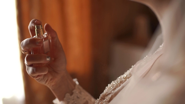 The Bride Gently Spray Perfume Around His Neck