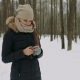 Beautiful Smiling Young Woman Using Mobile in the Winter Park - VideoHive Item for Sale