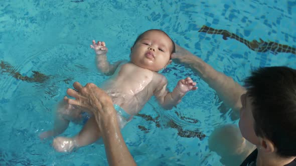 Baby Learning To Swim