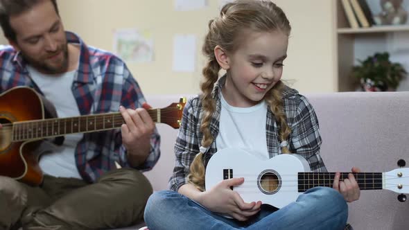 Father Guitar and Daughter Ukulele Playing Song, Creative Leisure, Rehearsal