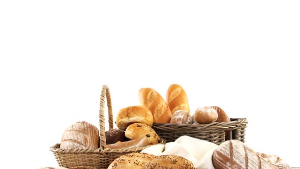 Various types of bread in wicker basket