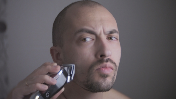 Male Carefully Shaving His Beard Off, Hair Grooming, Personal Hygiene