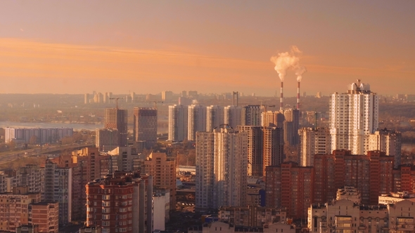 Winter Modern City, View From the Roof of a Tall House. Traffic in the City