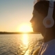 Teenage Girl Wearing Headphones at Sunset - VideoHive Item for Sale