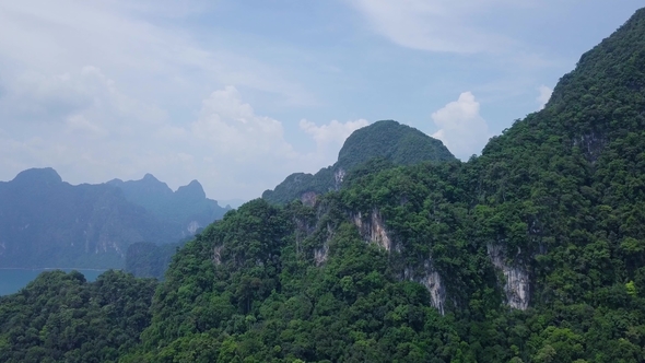 Limestone Rocks Covered with Lush Tropical Greenery. Top View of Mountains in Krabi