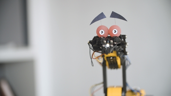 Funny Robot Is Shaking Head To Say NO. Experiment with Intelligent Manipulator. Industrial Robot