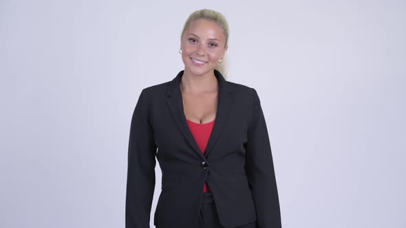 Young Happy Blonde Businesswoman Smiling