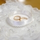 Gold Wedding Rings Lie in a White Box on Beautiful Pillow with Lace and Rhinestones - VideoHive Item for Sale