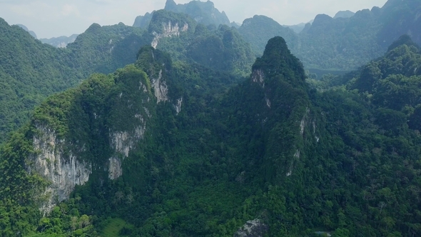View of Limestone Rocks Covered with Lush Tropical Greenery. Top View of Mountains in Krabi