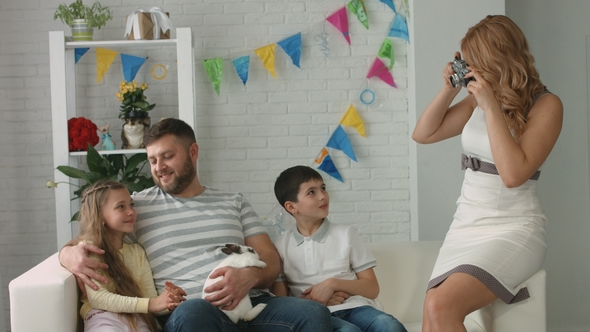 Mom Takes Pictures of Her Family with the Easter Bunny