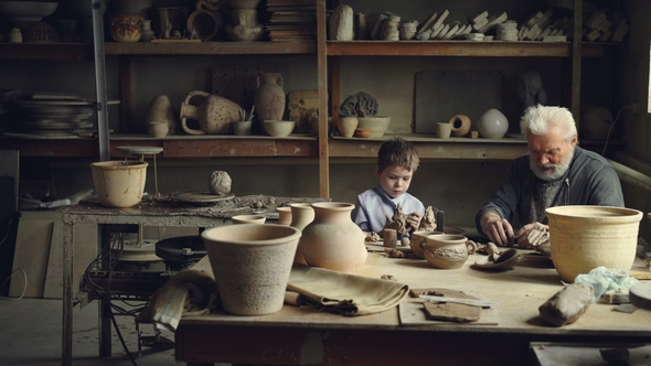 Pottery Master Is Making Clay Balls Preparing To Form Ceramic Figures and Showing Them