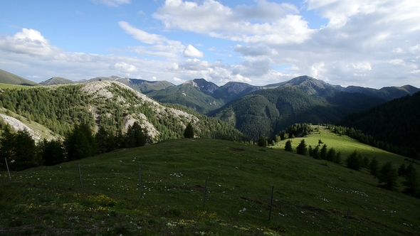 Discover in the Alps - Camera Tilts Up To Show the Beautiful Mountain in Italy