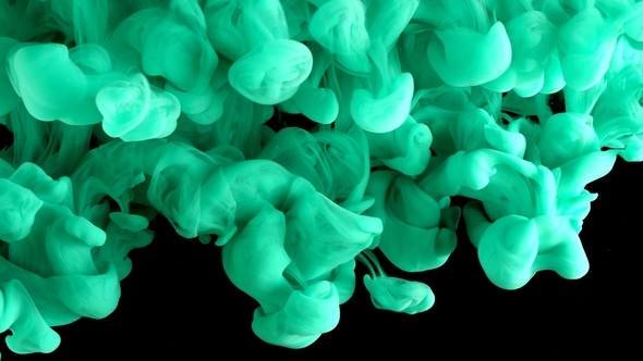 Ink in Water. Colour Turquoise Glitter Paint Reacting in Water Creating Abstract Cloud Formations alt