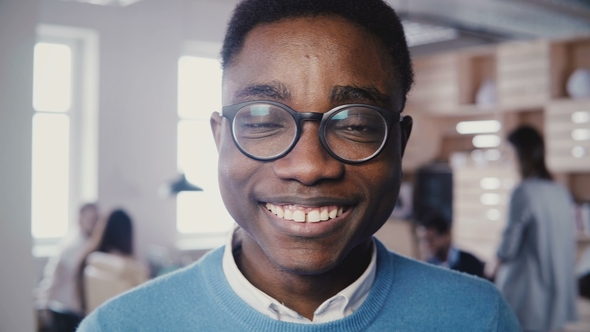 Incredible  Portrait of Handsome Young African American Man in Glasses Smiling at Camera in Bus