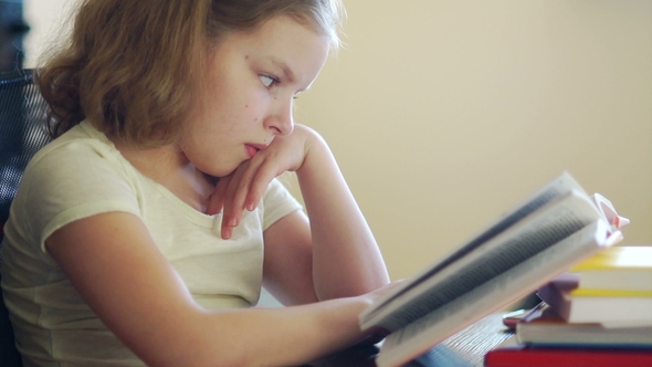 The Girl Does Not Want To Learn Lessons, She's Bored, She Pushes a Pile of Books and Takes in Her