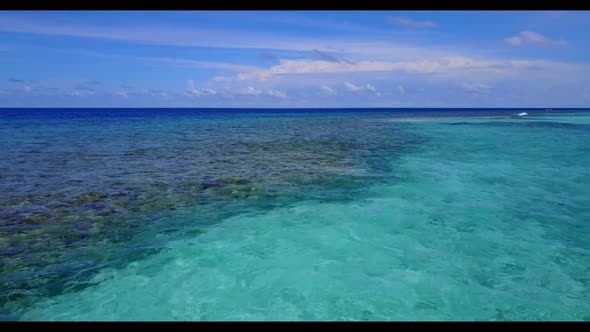 Aerial flying over sky of beautiful sea view beach trip by turquoise lagoon with white sandy backgro