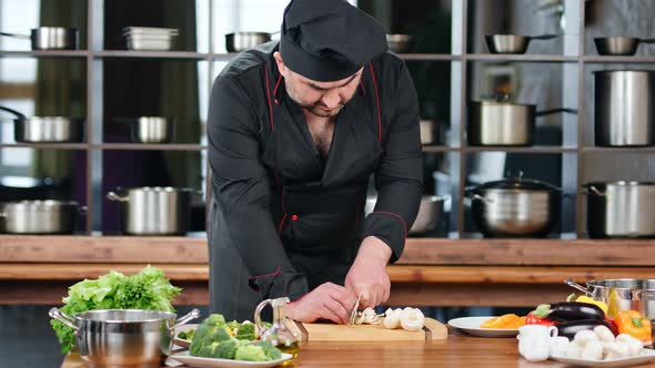 Confident Bearded Chef Prepare Meal at Cuisine