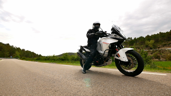 Motorcyclist Driving his Sports Motorbike on a Curvy Road Slow Motion