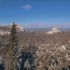 Aerial View Winter Snowscape with Forest, Trees and Snowy Cliffs. Blue Sky. Winter Landscape - VideoHive Item for Sale