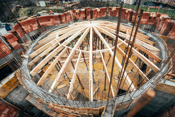 wooden timber, beams and shingles. Architecture dome details at construction site