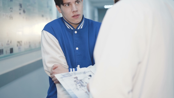 Meet Between Doctor and Patient in Hospital