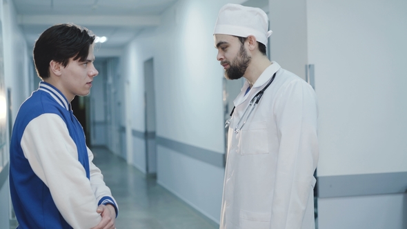 Meet Between Doctor and Ill Patient in Hospital