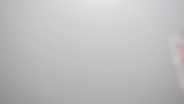 Big Pile of 100 Yuan Banknotes Falling on the White Table, Chinese Currency