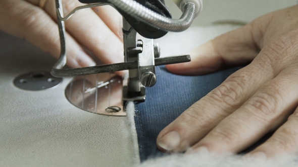 Slowly View of Stitching a Jacket with Sewing Machine