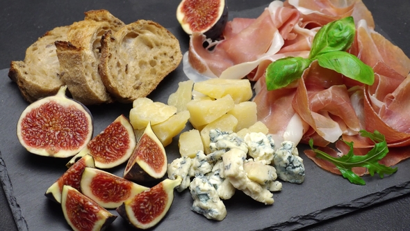 Traditional Cheese and Meat Plate Wth Parma, Parmesan and Figs