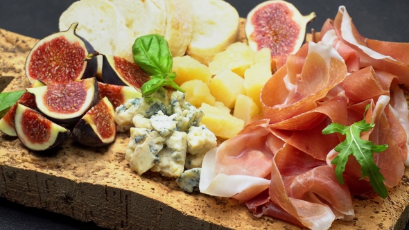 Traditional Cheese and Meat Plate Wth Parma, Parmesan and Figs