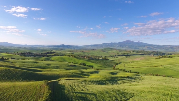 Tuscany Aerial of Farmland Hill Country at Evening