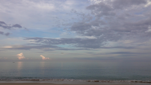 Airplane Before Landing Over Beach at Morning