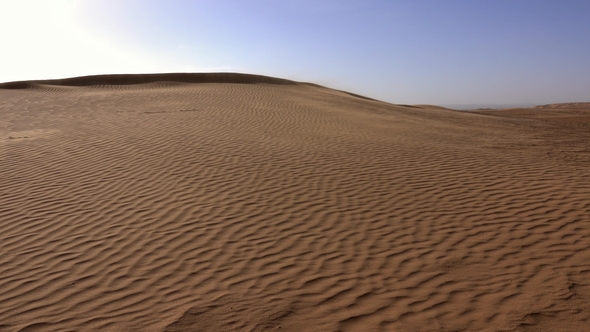Sand Blowing Over Dunes in Wind, Sahara Desert