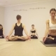 People Doing Yoga Exercises on Yoga Class - VideoHive Item for Sale