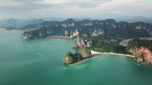 Aerial of Tropical Beach Between Rocks and Islands