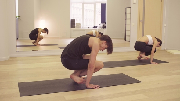 People Doing Yoga Asanas on Yoga Class