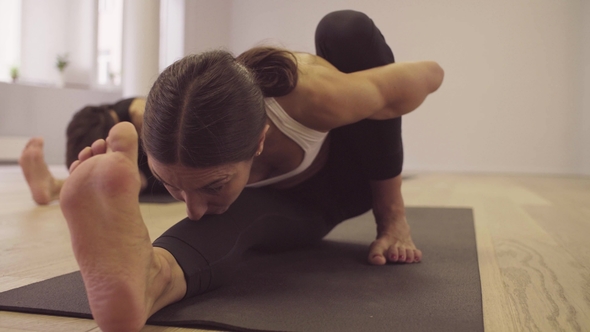 Yoga Class. Woman Doing Yoga Asanas