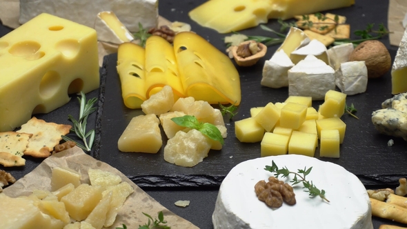 Video of Various Types of Cheese - Parmesan, Brie, Cheddar and Roquefort