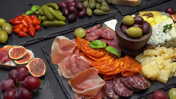 Various Type of Italian Meal or Snack - Cheese, Sausage, Olives and Parma