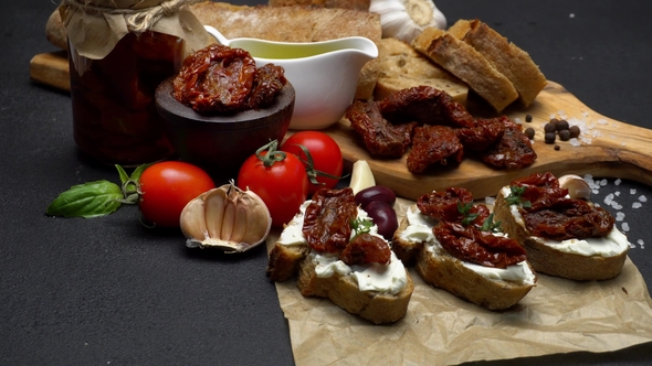 Bruschetta with Canned Sundried or Dried Tomato Halves on Craft Pepper