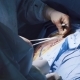 Hands of the Two Surgeons During Suturing - VideoHive Item for Sale