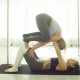 Two Young Women Practicing Acrobatic Yoga - VideoHive Item for Sale