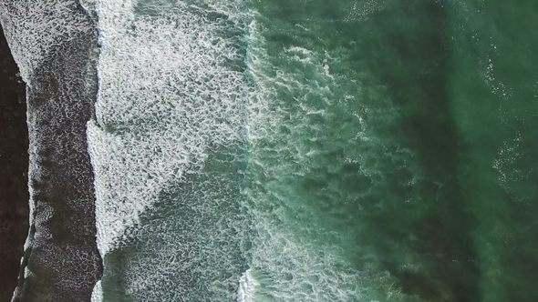 Aerial Tilt View on Ocean Waves on Atlantic Coast