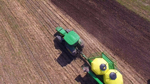 Modern Tractor in Work on a Farm, Top View.