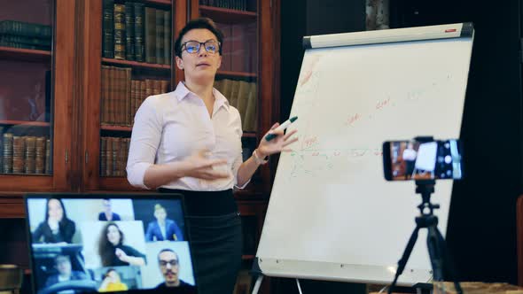 Female Teacher Is Teaching a Video Lesson