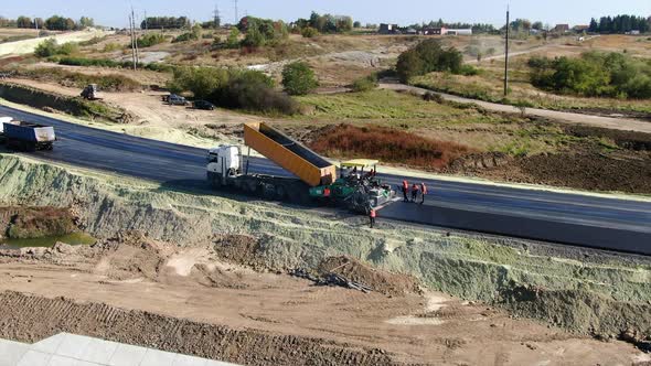 Aerial View Making New Asphalt at Road Construction