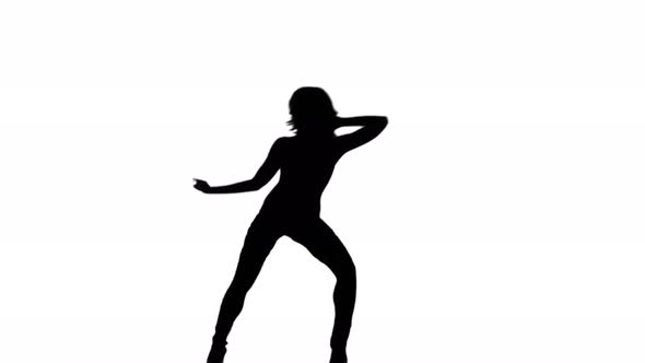 A Silhouette Woman Is Casually Dancing Against A White Background